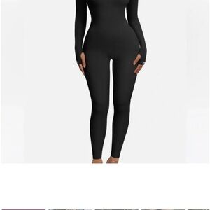 OQQ Black Robbed Crew Neck Fitted Jumpsuit